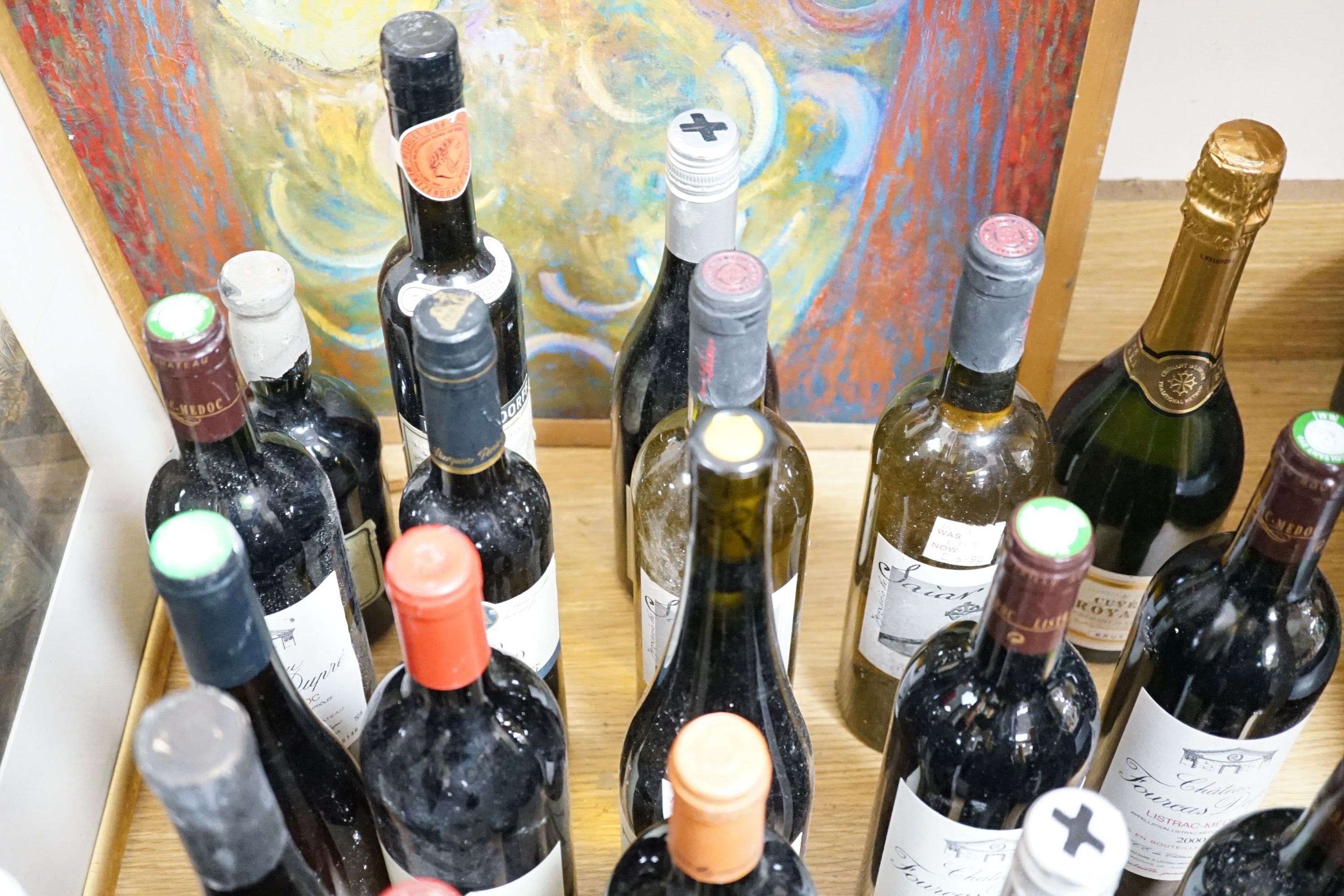Twenty nine assorted bottles of wine is etc. including Les Tourelles de Longueville, 2003, Chateau Fourcas Dupre, 2000, Perrier Jouet Grand Brut Champagne, Chateau Sigognac, 1985 and Cote Rotie, 2001.